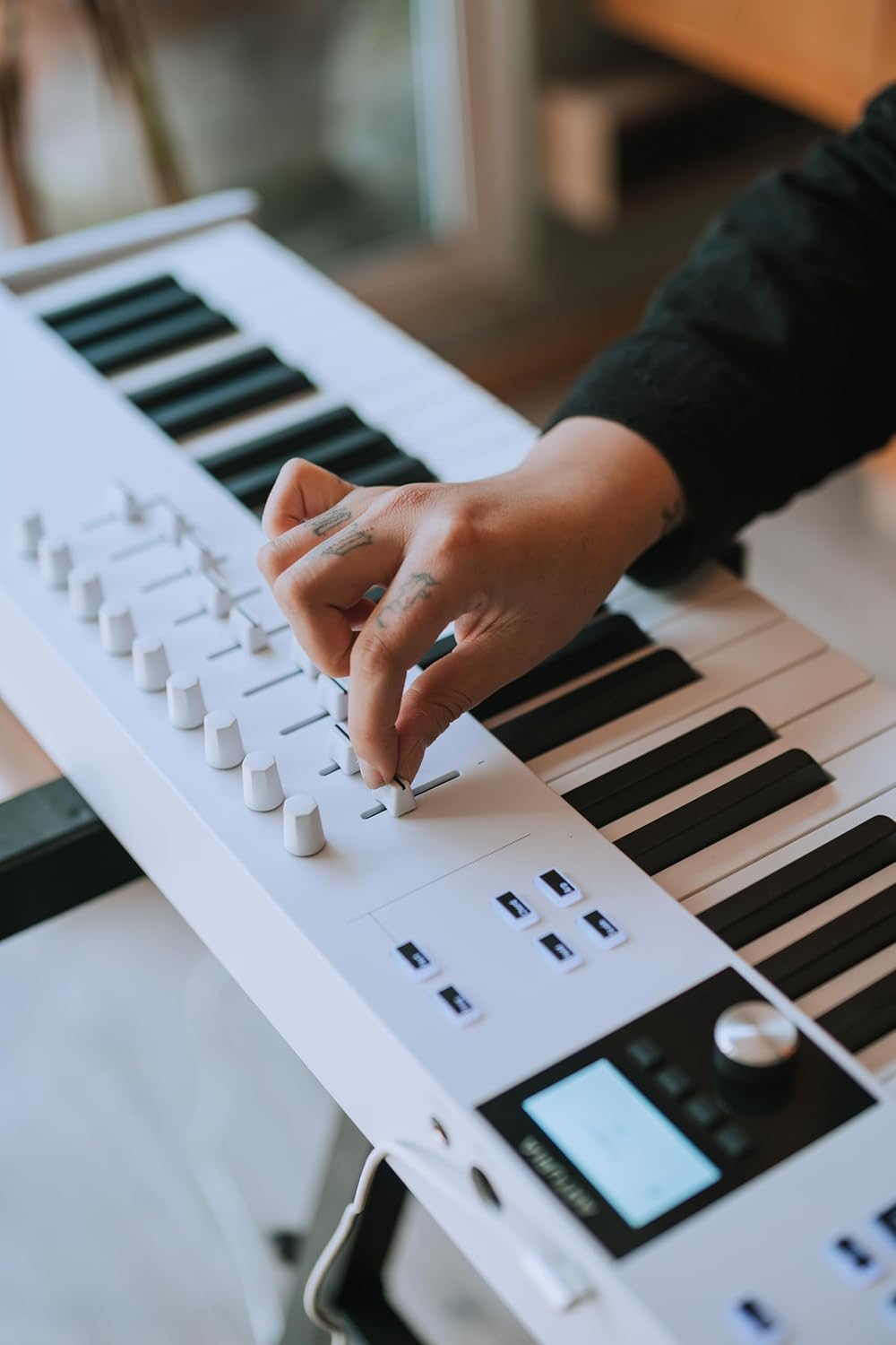 Arturia KeyLab Essential 88 mk3 with 88 Velocity-Sensitive keys, 9 Encoders, 9 Sliders, 8 RGB Pads - USB-C, Midi Out, LCD Screen, Bundled Software and DAW Integration - White